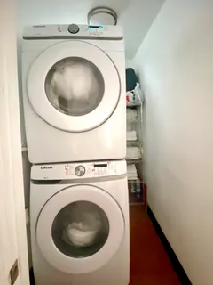 a utility room with dryer and washer