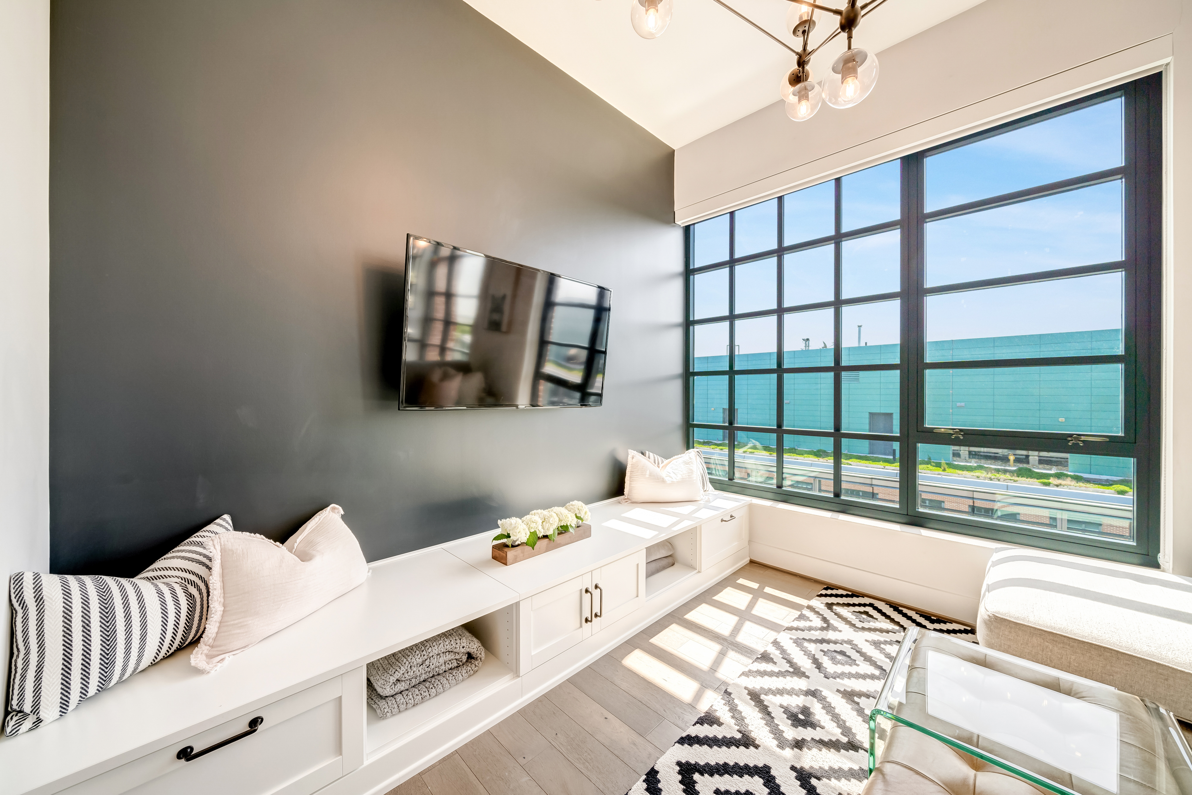 45 Sutton Square Southwest, Unit PH10 Washington, DC 20024 - Photo 9 of 44 a bedroom with furniture and a large window