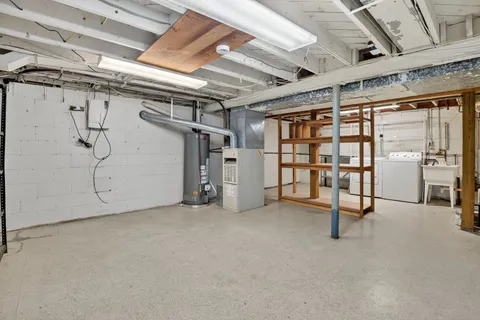 a view of an empty room with a roof