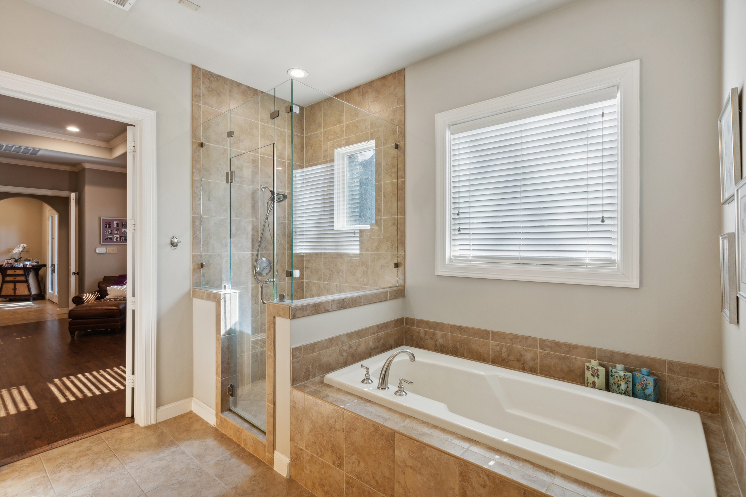 8411 Midway Road Dallas, TX 75209 - Photo 22 of 29 a bathroom with a tub a sink and a shower