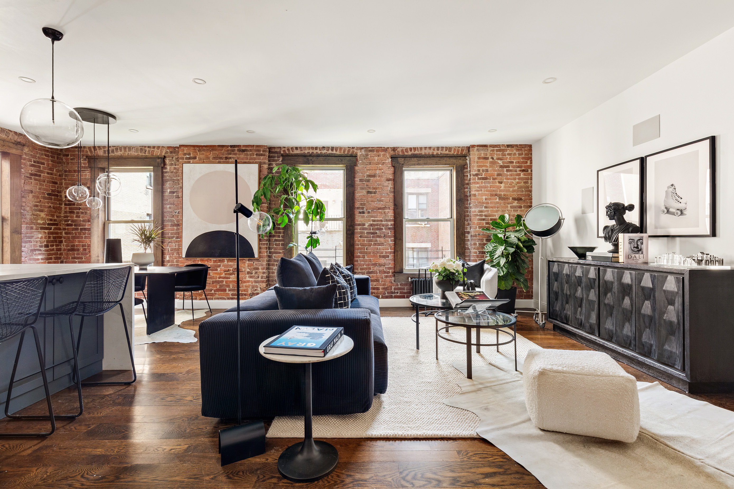 311 West 97th Street, Unit 5N Manhattan, NY 10025 - Photo 2 of 16 a living room with furniture and a large window