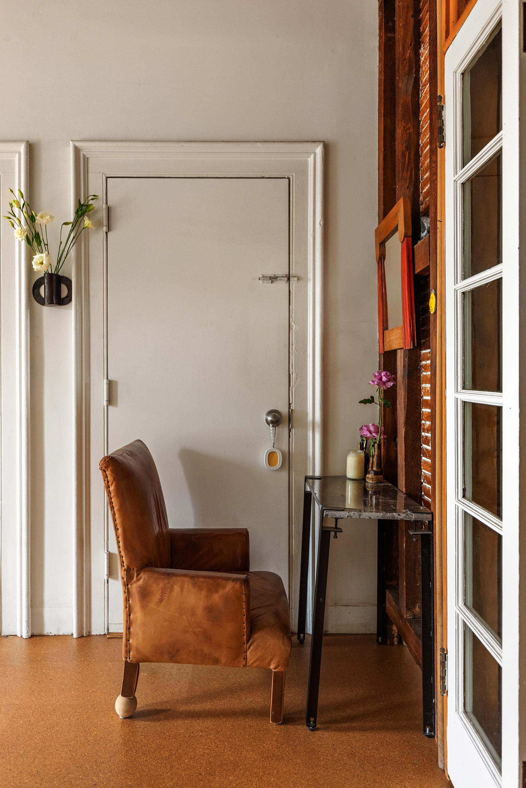 151 Grand Street, Unit 8 Brooklyn, NY 11249 - Photo 13 of 20 a chair and a rug sitting in a room