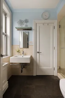 a bathroom with a sink a mirror and a bathtub