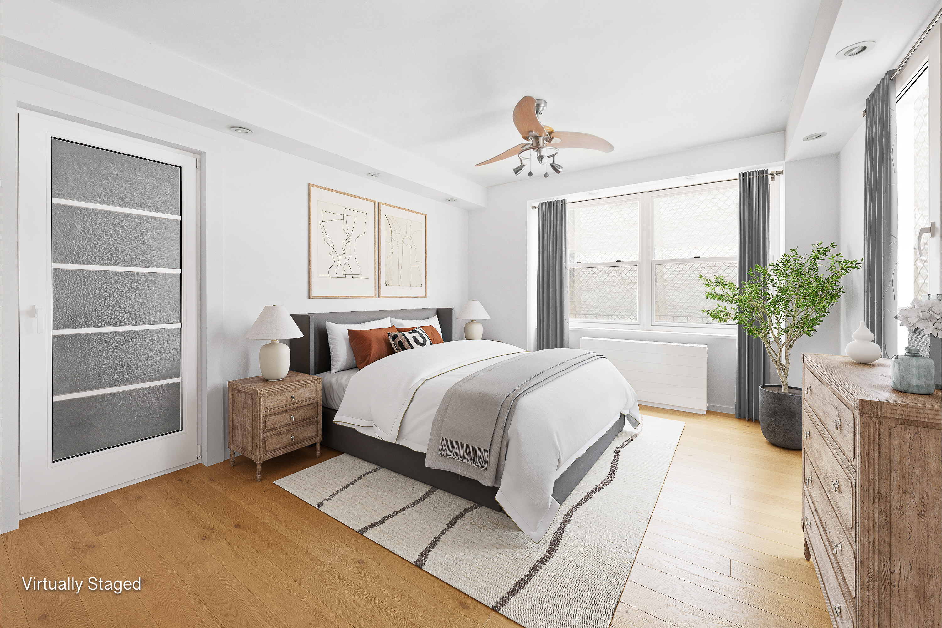 400 East 77th Street, Unit 1CD Manhattan, NY 10075 - Photo 7 of 18 a spacious bedroom with a large bed and a chandelier