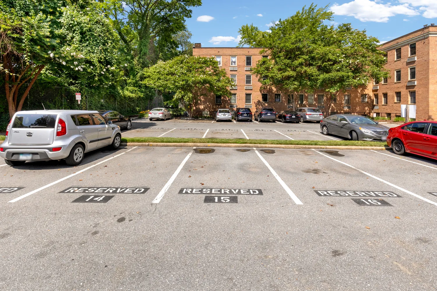a view of street with parked cars