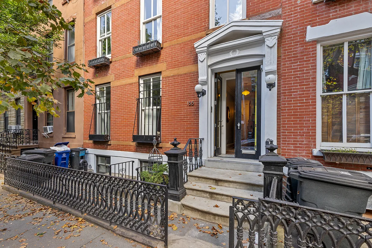 155 Luquer Street, Unit 1 Brooklyn, NY 11231 - Photo 1 of 13 a view of a building with two windows