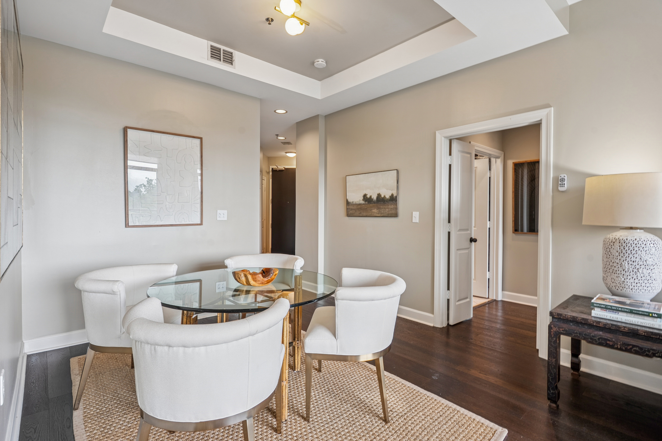 2626 Peachtree Road, Unit 1108 Atlanta, GA 30305 - Photo 6 of 25 a living room with a couch and a table