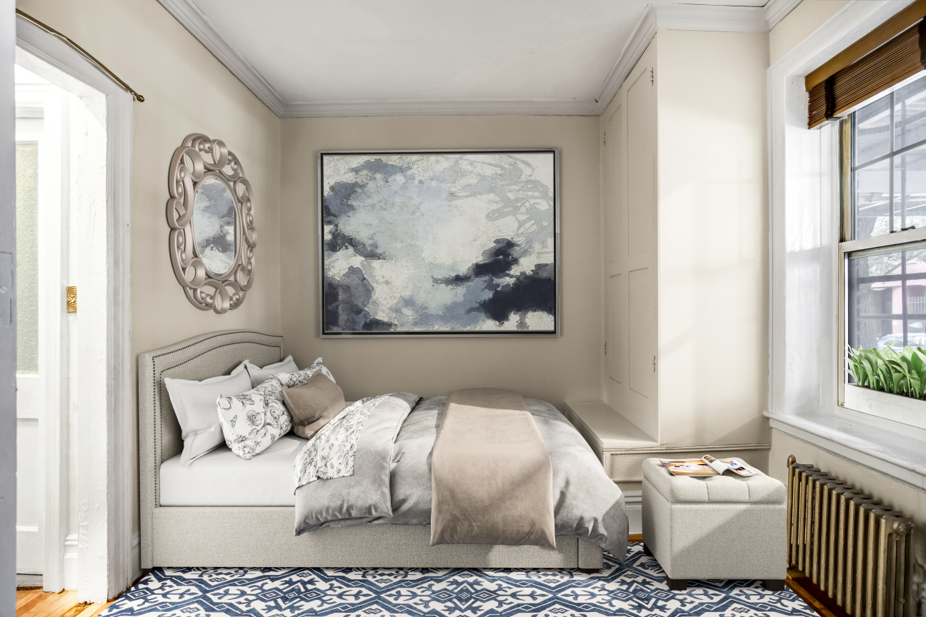 344 West 12th Street, Unit 1A Manhattan, NY 10014 - Photo 10 of 17 a living room with furniture and a large window