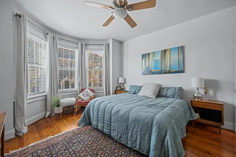 a bathroom with a sink toilet and mirror