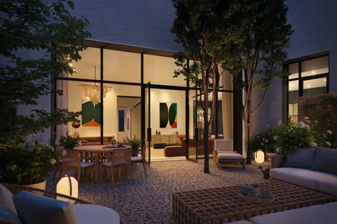 a view of a patio with couches table and chairs and potted plants