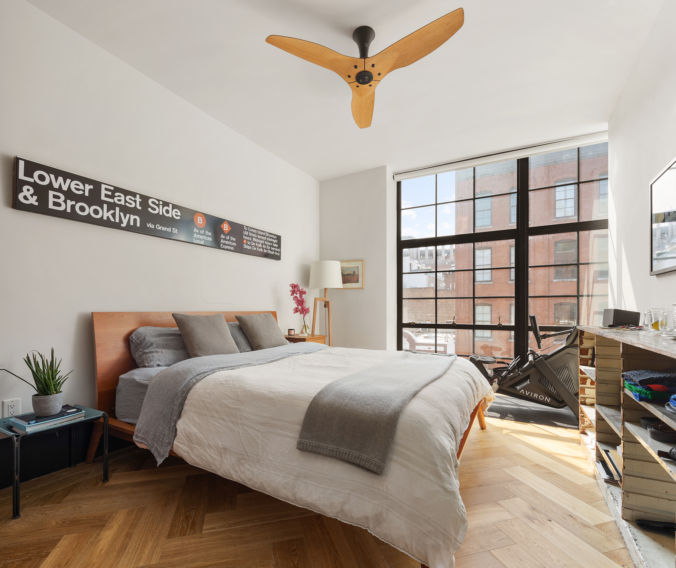 51 Jay Street, Unit 4E Brooklyn, NY 11201 - Photo 5 of 12 a bedroom with a bed a couch and a window