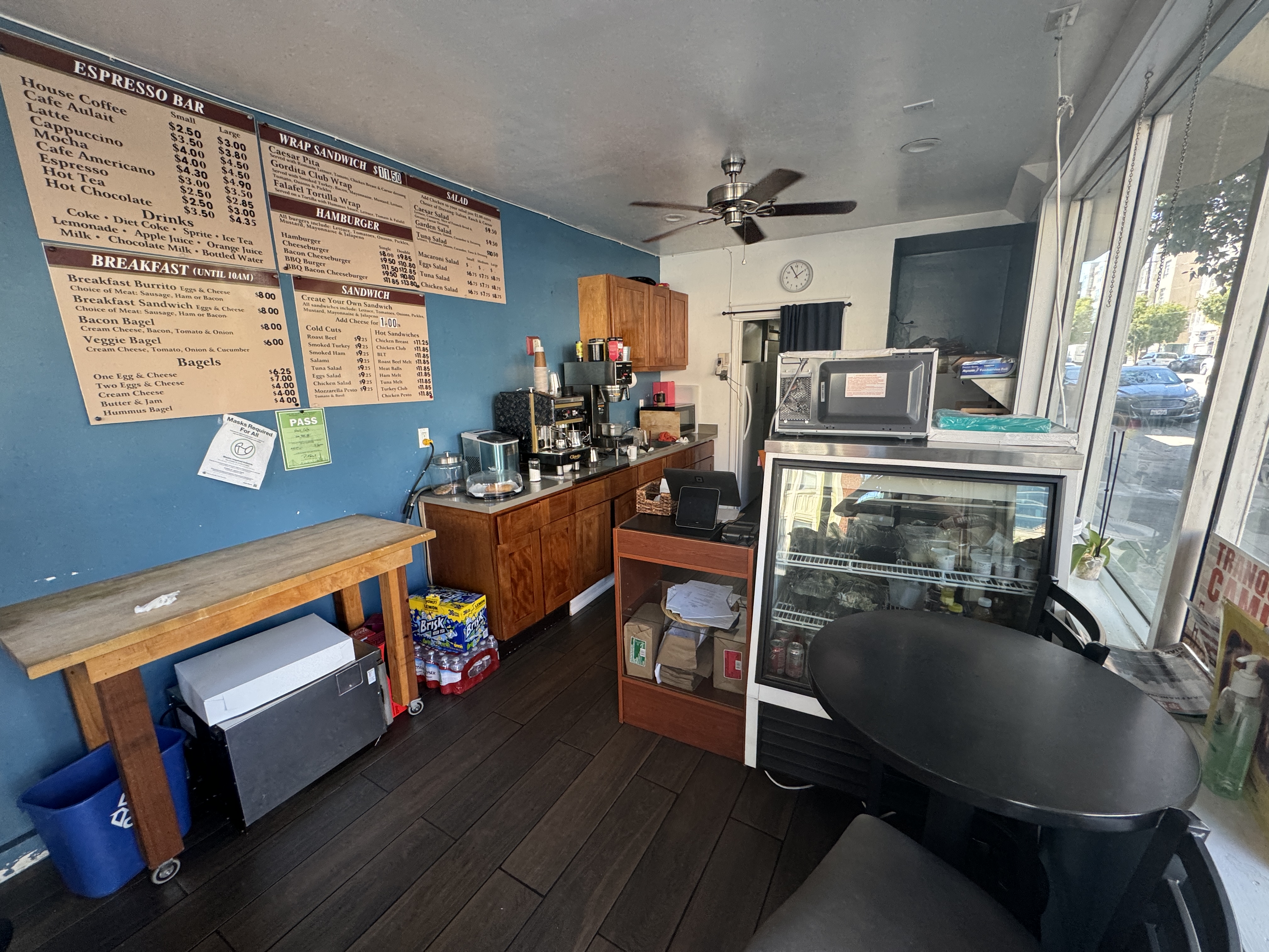 201 Fell Street San Francisco, CA 94102 - Photo 21 of 30 a living room with furniture a flat screen tv and floor to ceiling window