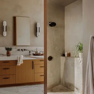a bathroom with a tub and a sink