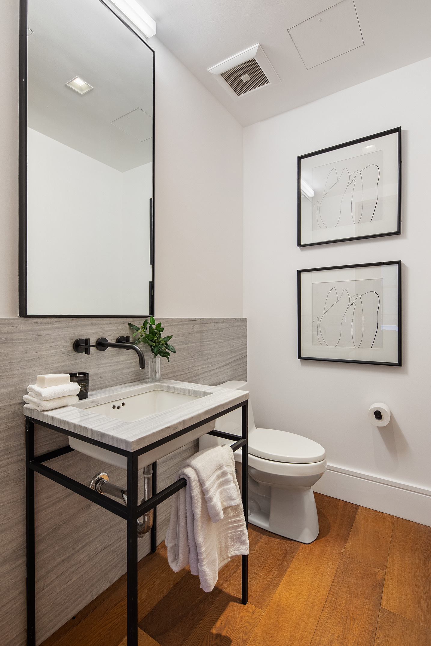 36 Bleecker Street, Unit 3DC Manhattan, NY 10012 - Photo 15 of 30 a bathroom with a toilet a sink and mirror