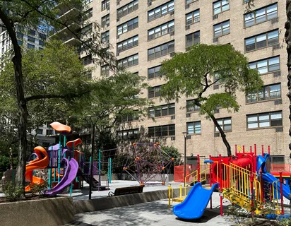 a view of water fountain in front of building