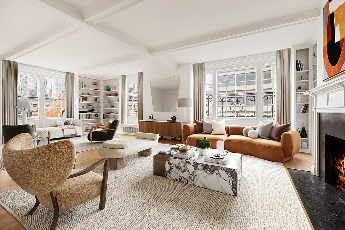 a living room with furniture large windows and wooden floor