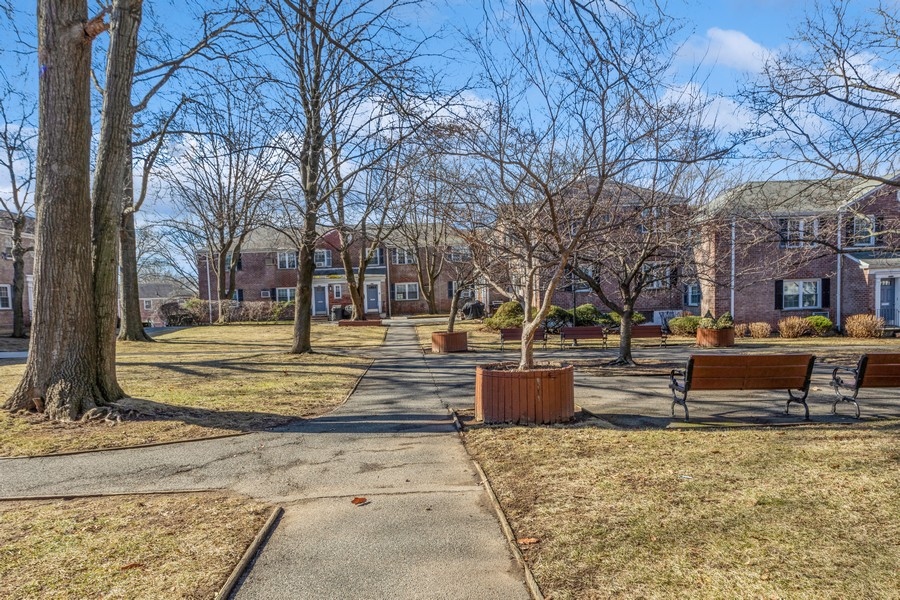 224-46 Horace Harding Expressway, Unit 630 Queens, NY 11364 - Photo 27 of 29 a view of the house with a yard