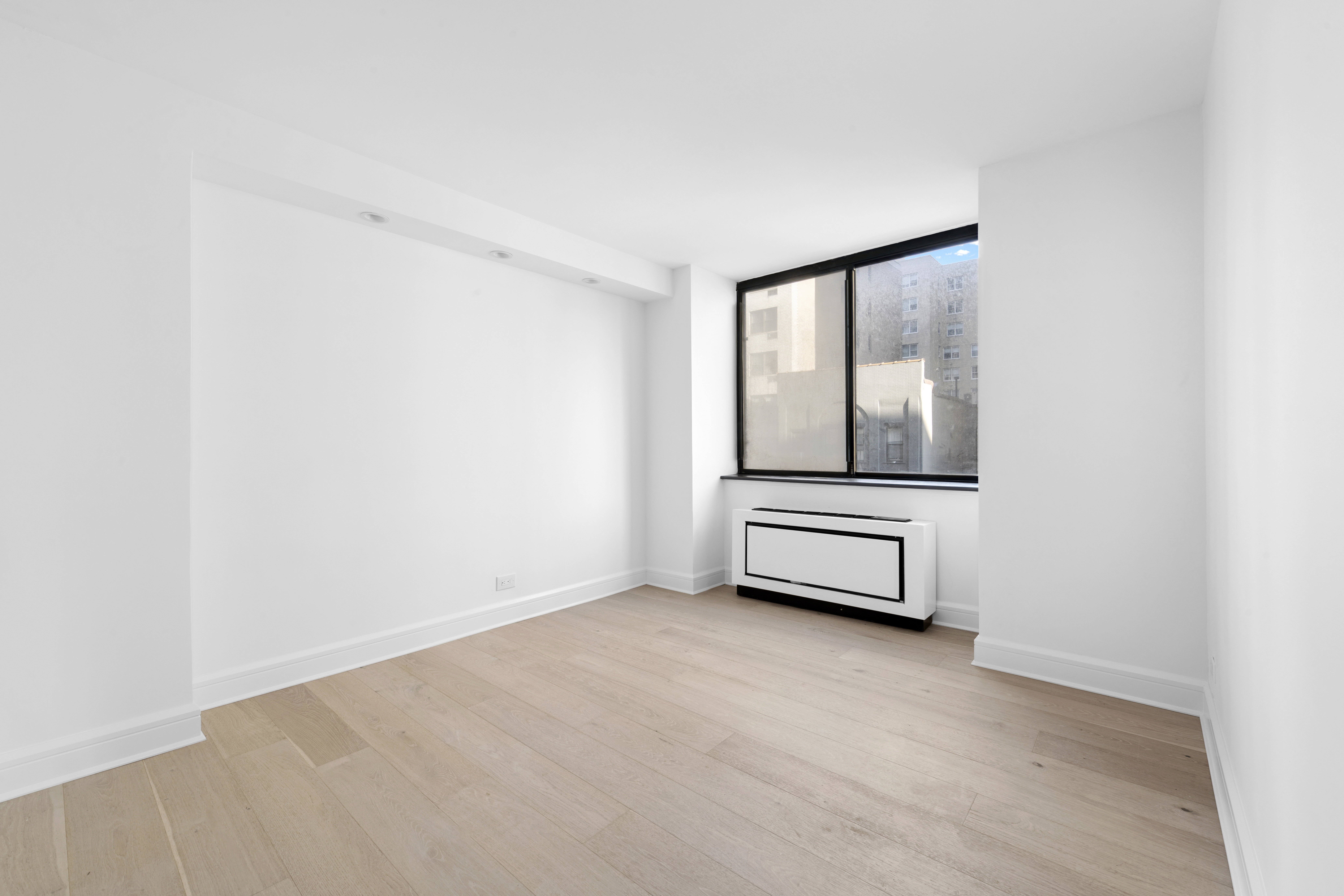 330 East 75th Street, Unit 5B Manhattan, NY 10021 - Photo 8 of 11 a room with a bench