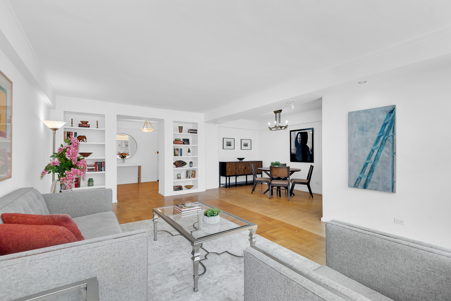 120 East 81st Street, Unit 8A Manhattan, NY 10028 - Photo 2 of 10 a living room with furniture and a table