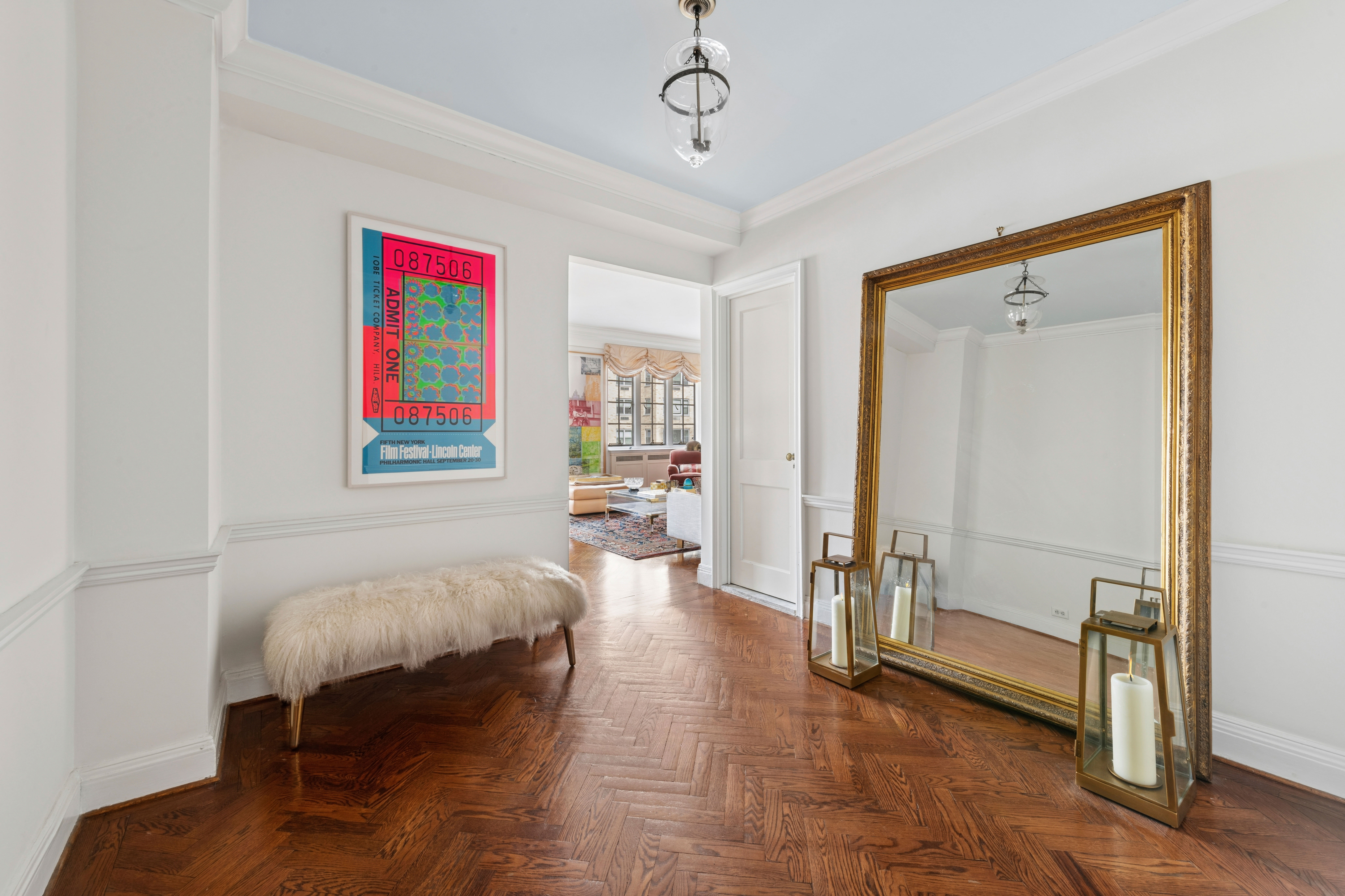 520 East 86th Street, Unit 9B Manhattan, NY 10028 - Photo 2 of 18 a bedroom with furniture and a window