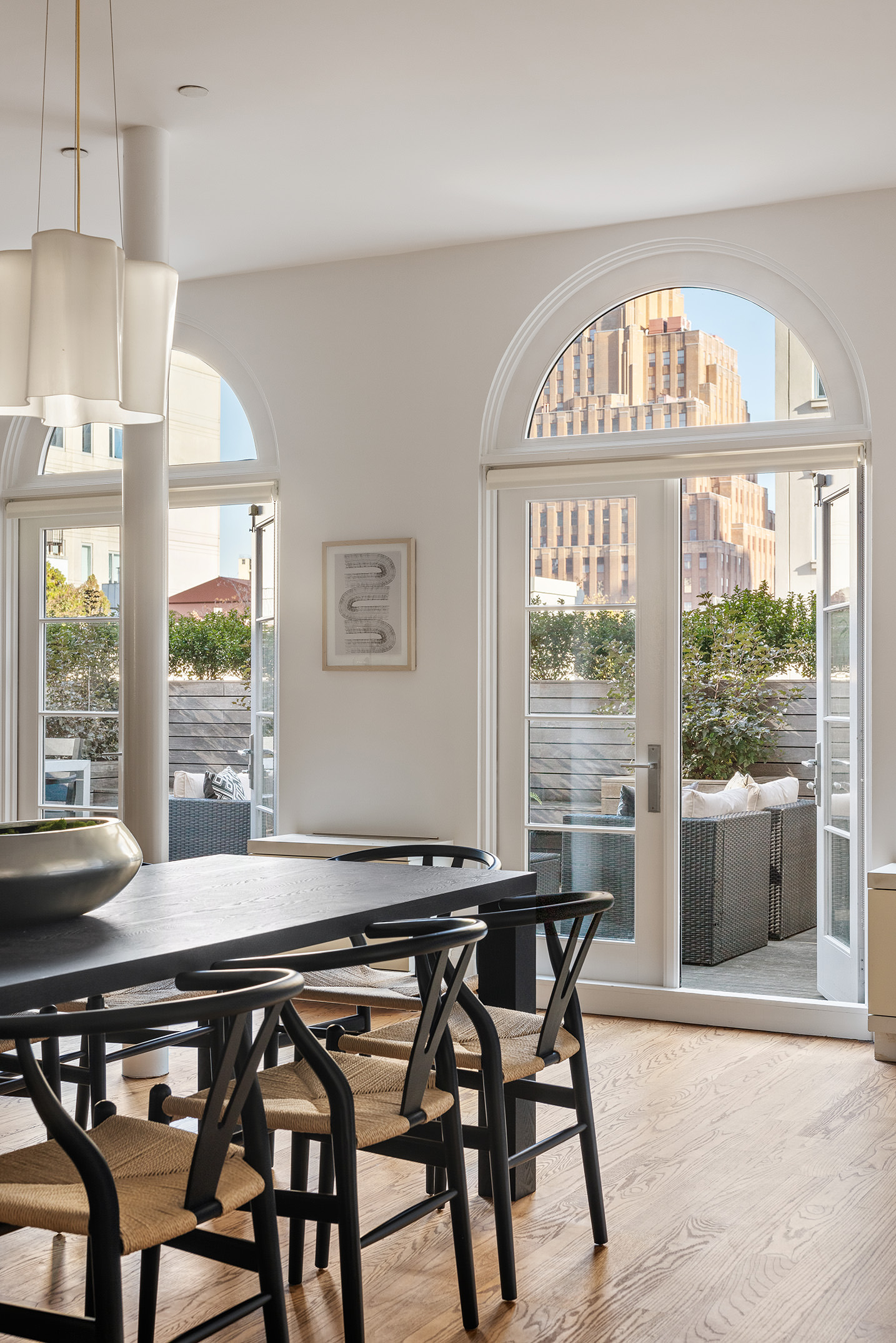 41 Warren Street, Unit 6 Manhattan, NY 10007 - Photo 4 of 23 a view of a dining room with furniture window and outside view