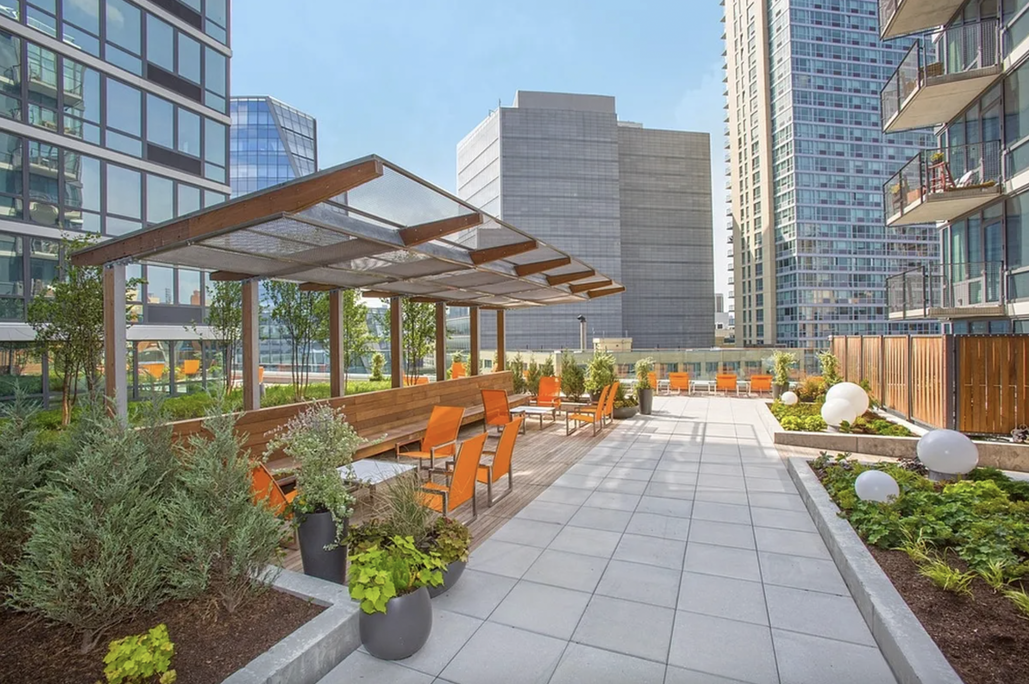 43-25 Hunter Street, Unit 4312W Queens, NY 11101 - Photo 11 of 16 a view of a house with sitting area and furniture