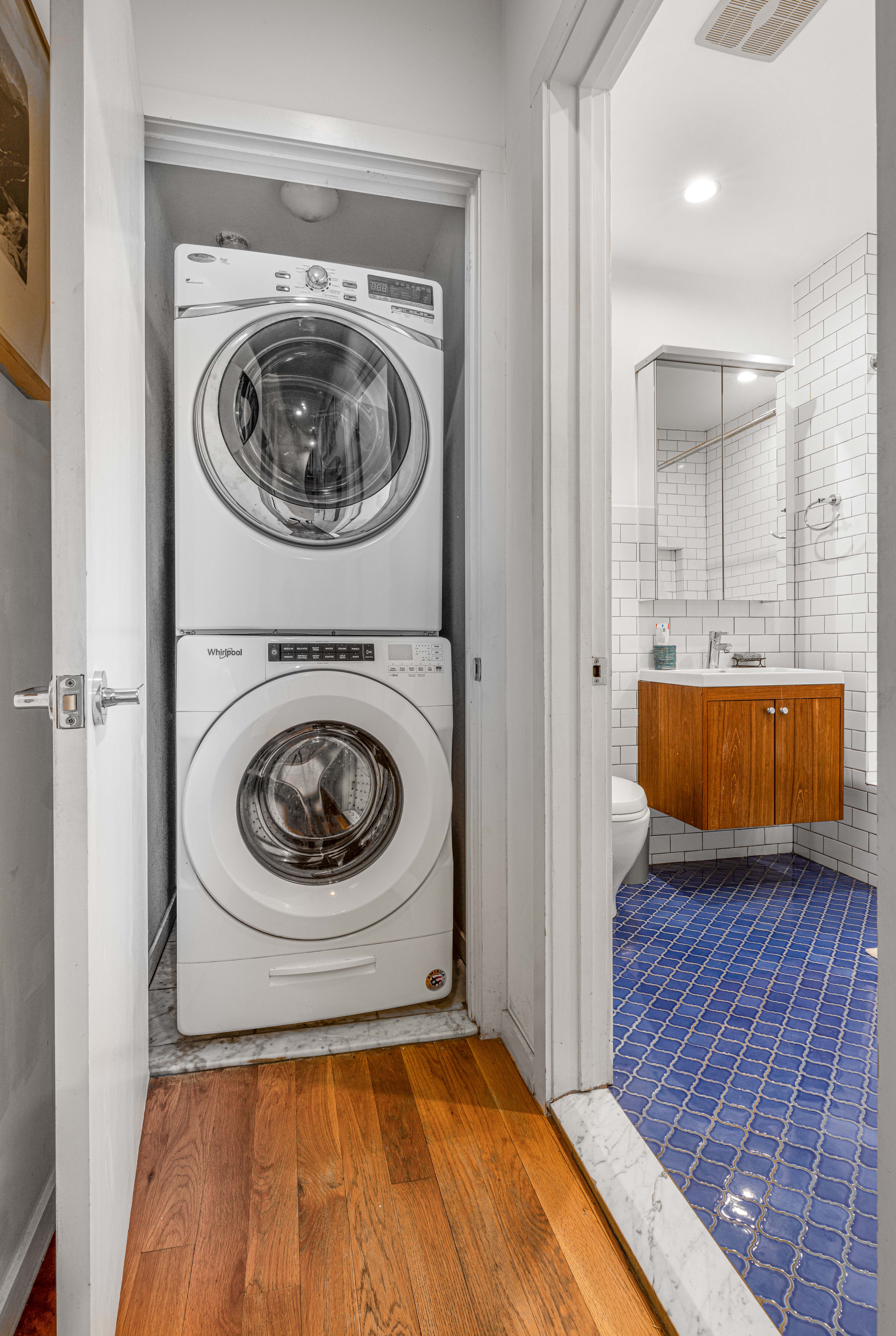 209 Calyer Street, Unit 2 Brooklyn, NY 11222 - Photo 14 of 17 a view of a bedroom with washer and dryer
