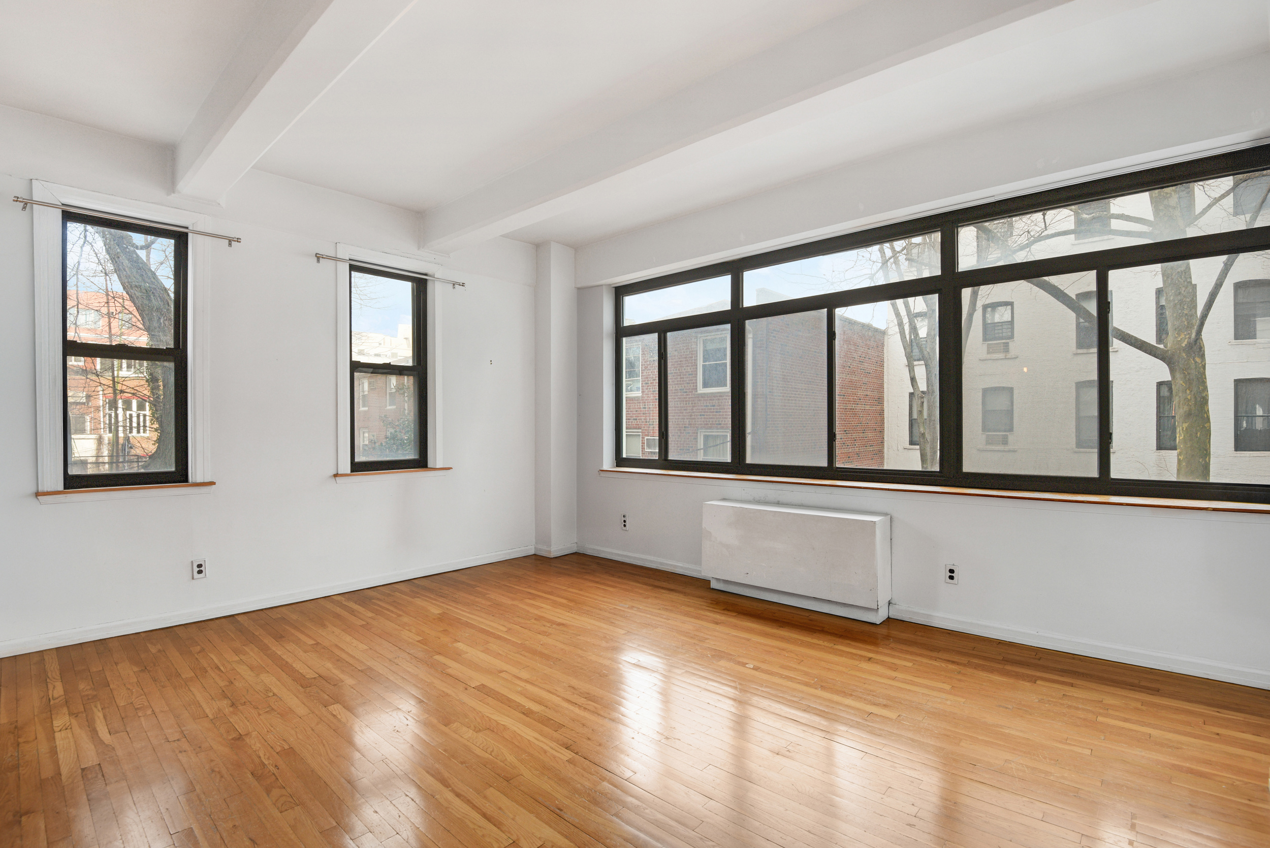 492 Henry Street, Unit 2A Brooklyn, NY 11231 - Photo 2 of 13 a view of an empty room with a window