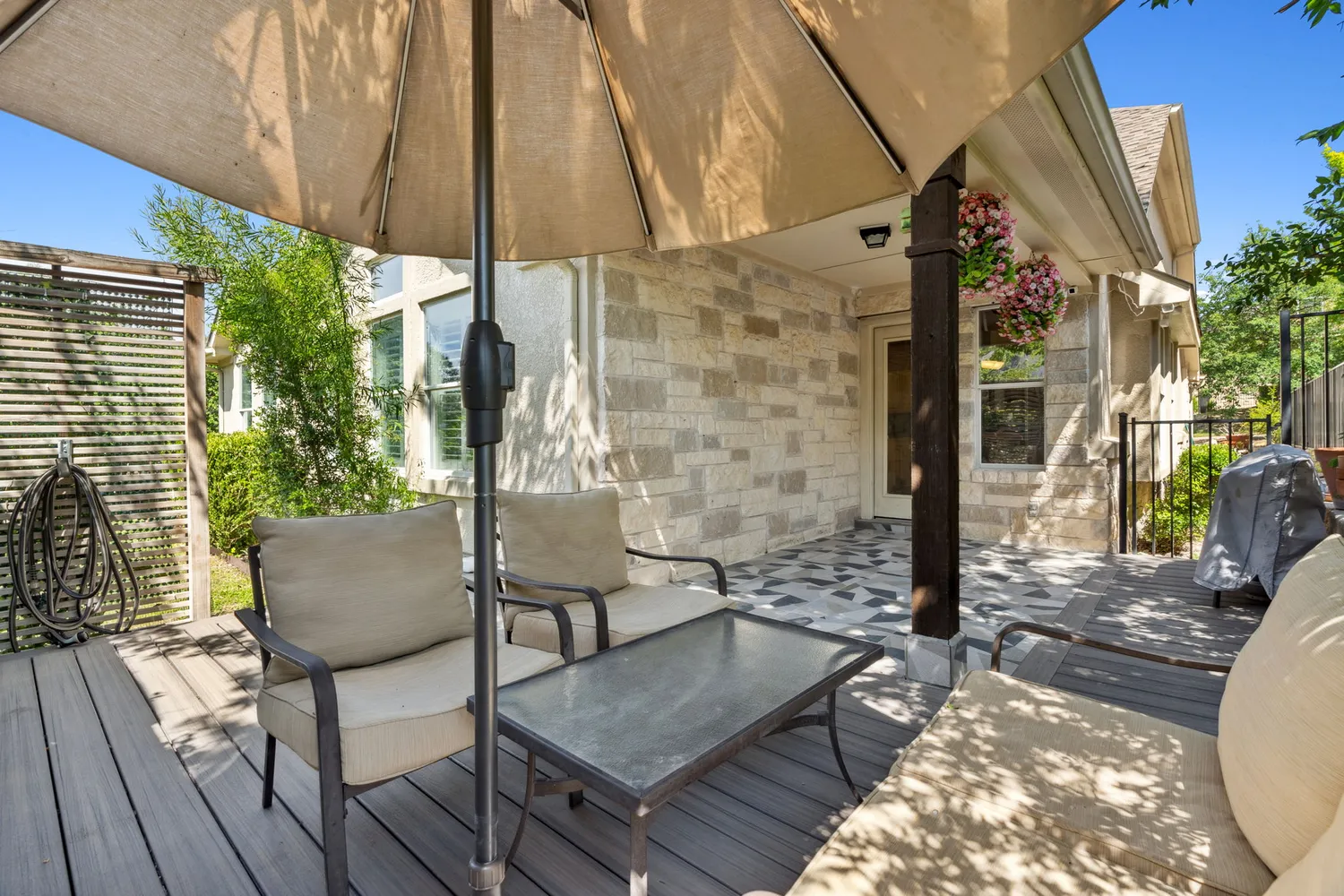 a view of balcony with furniture