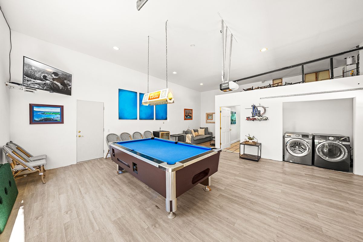 a room with furniture and wooden floor