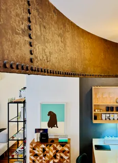 a view of a balcony with chair and table