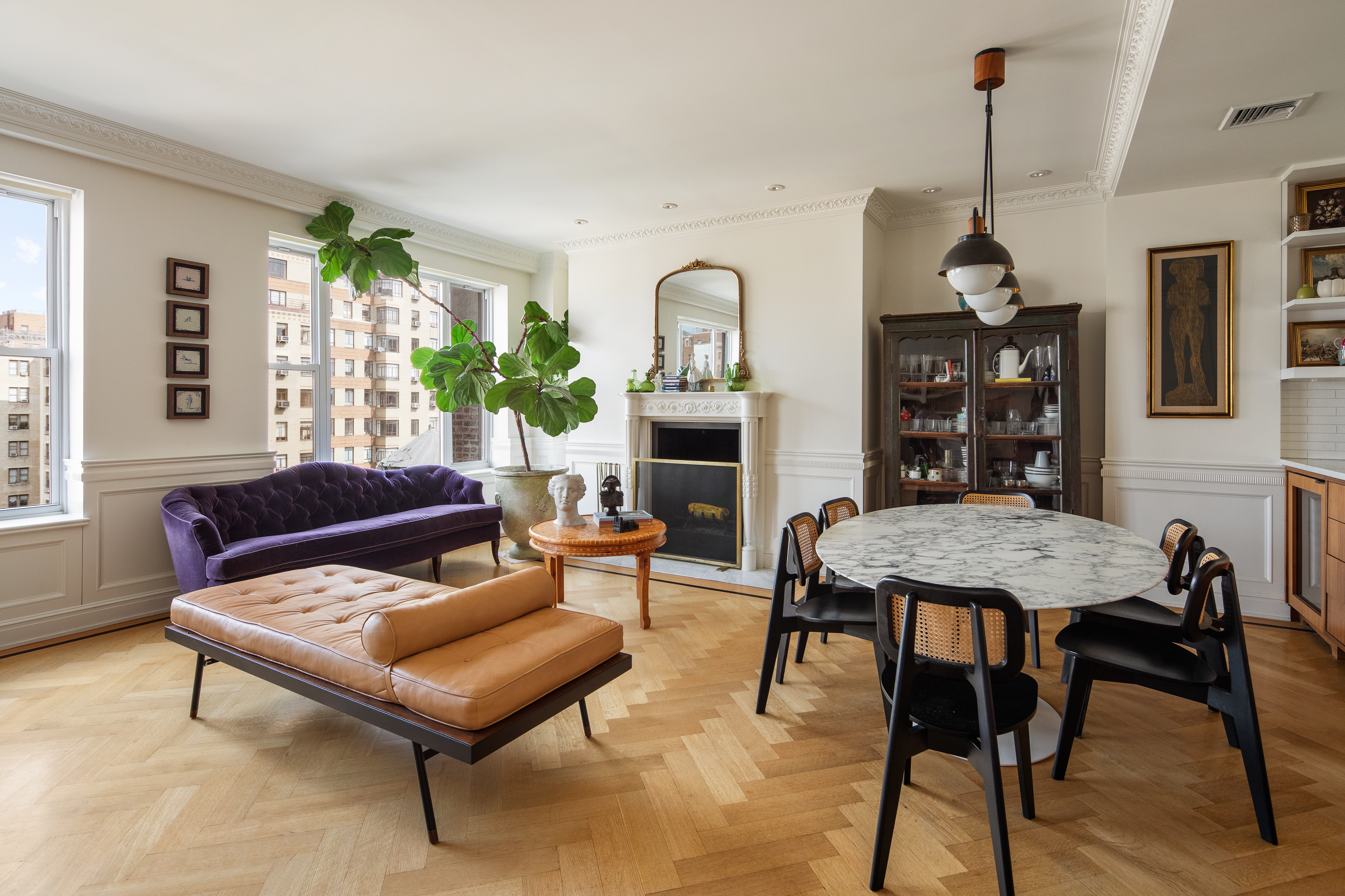 309 West 86th Street, Unit PH Manhattan, NY 10024 - Photo 3 of 16 a living room with furniture and a fireplace
