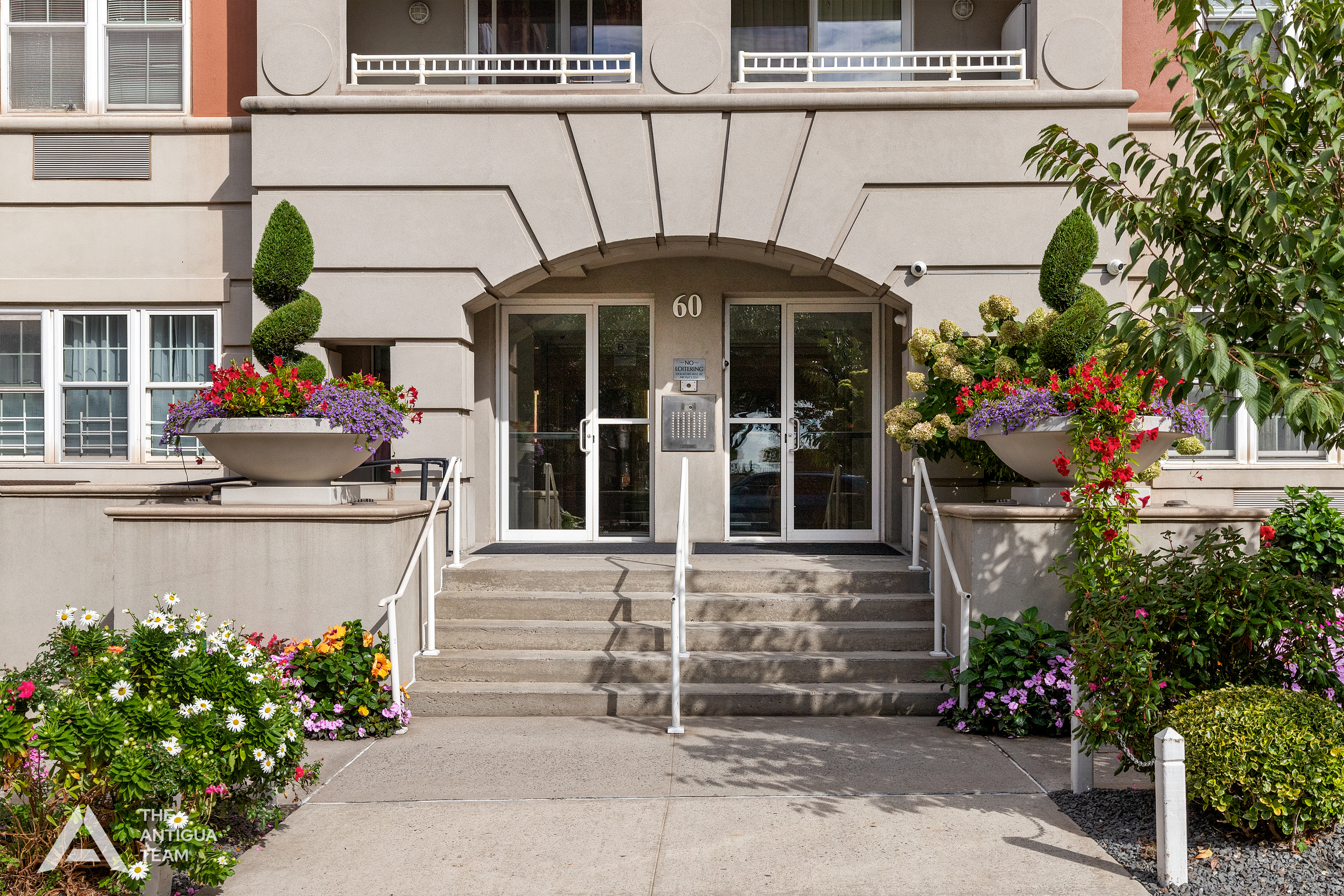 60 Oceana Drive West, Unit 10A Brooklyn, NY 11235 - Photo 14 of 16 a front view of a house with a garden