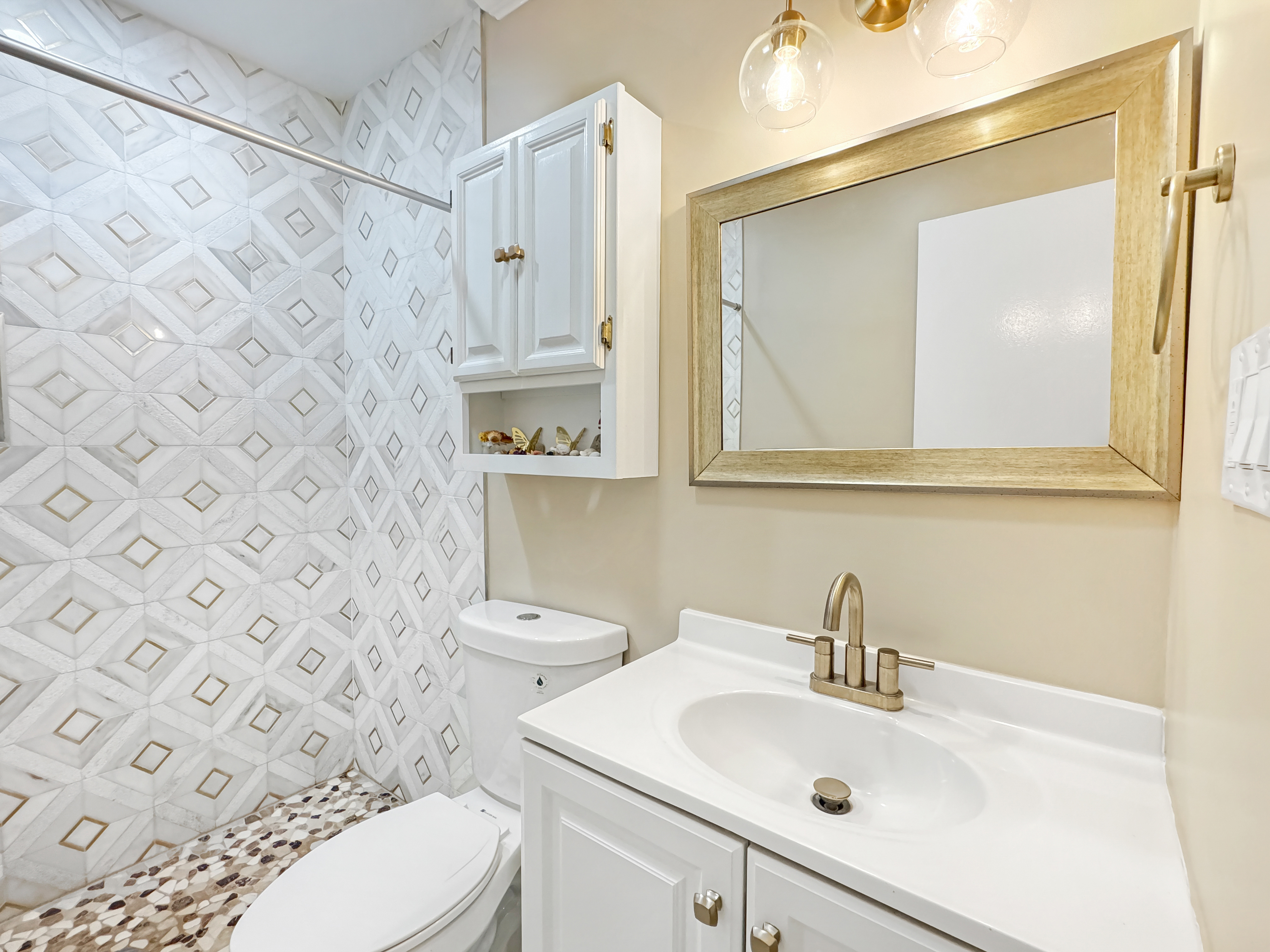 2408 Lillian Drive Silver Spring, MD 20902 - Photo 13 of 40 a bathroom with a sink a toilet and a mirror