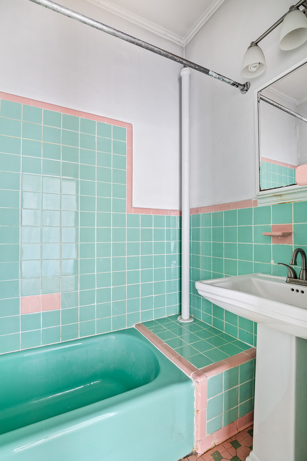 512 17th Street Brooklyn, NY 11215 - Photo 12 of 14 a bathroom with a sink and a bathtub