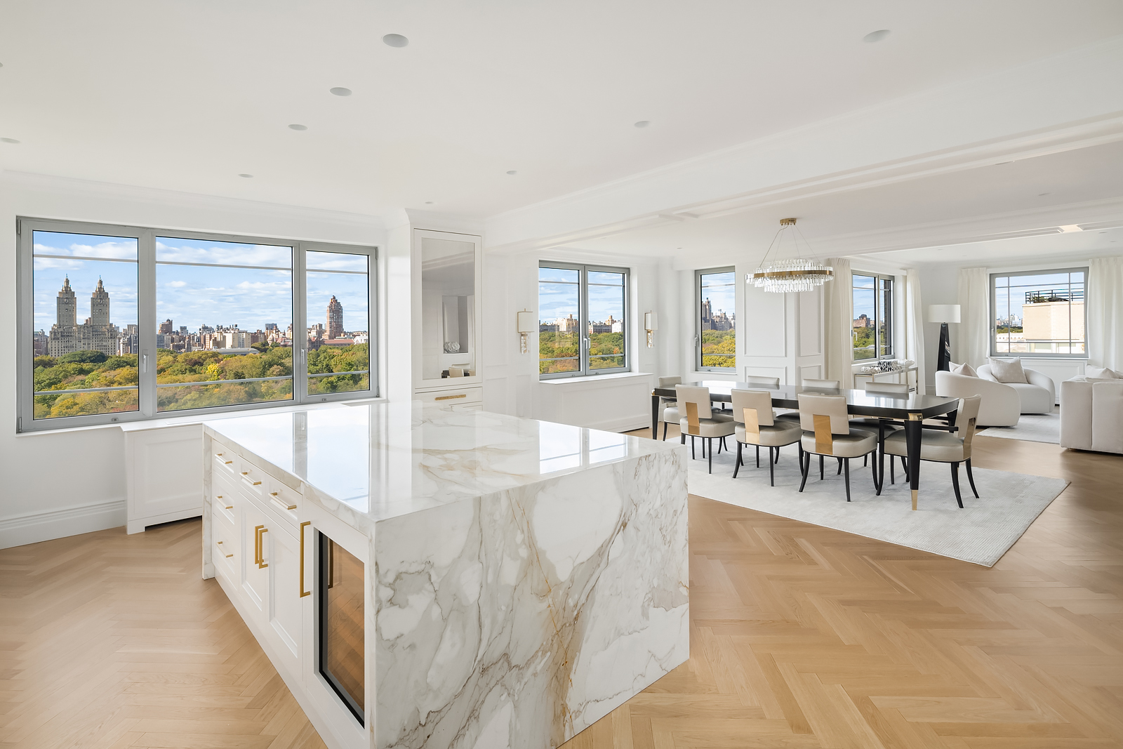 930 5th Avenue, Unit 18A Manhattan, NY 10021 - Photo 6 of 16 a large white dining space with furniture and a large window