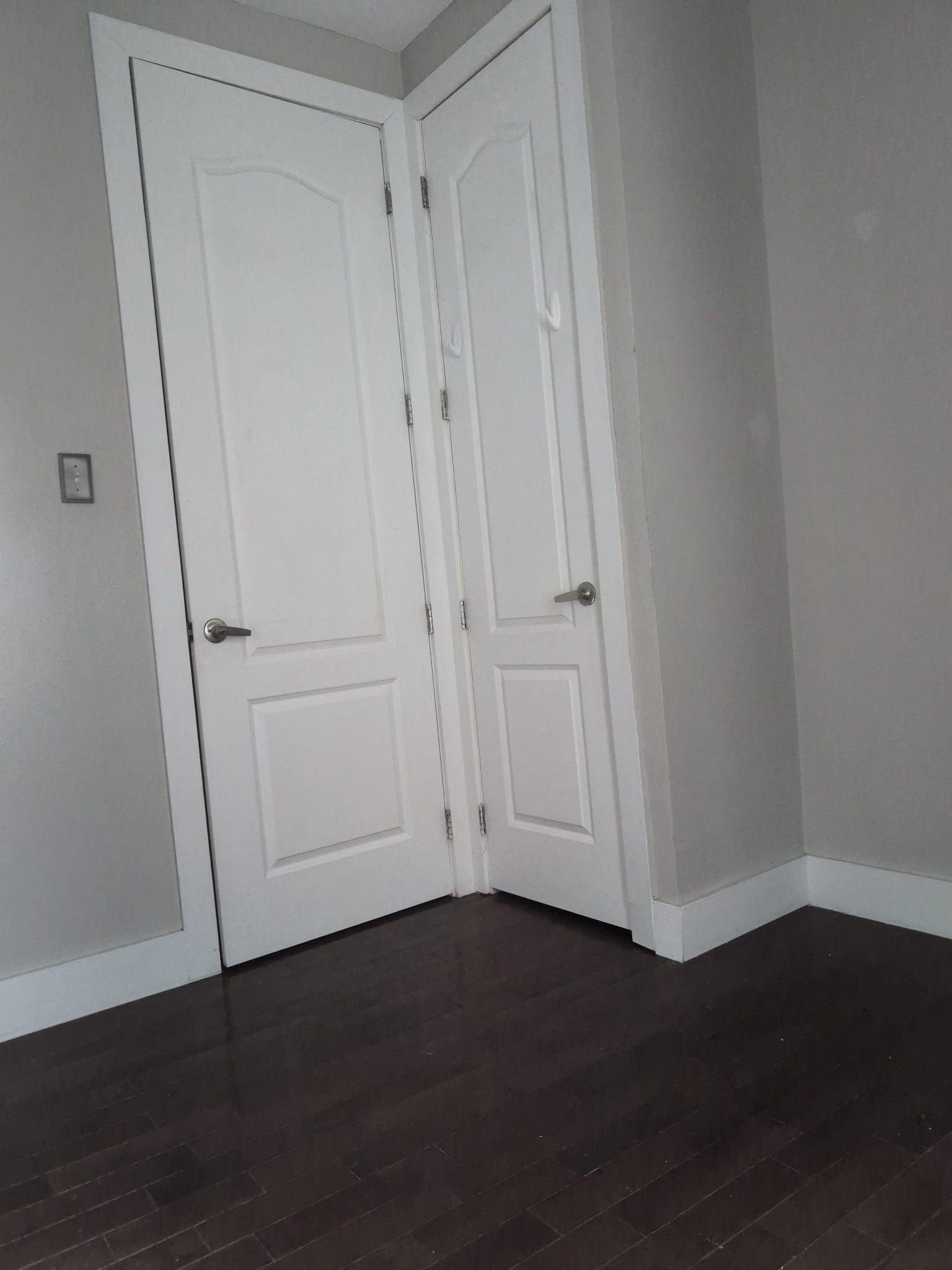 2405 Nostrand Avenue, Unit 6 Brooklyn, NY 11210 - Photo 9 of 11 an empty room with wooden floor