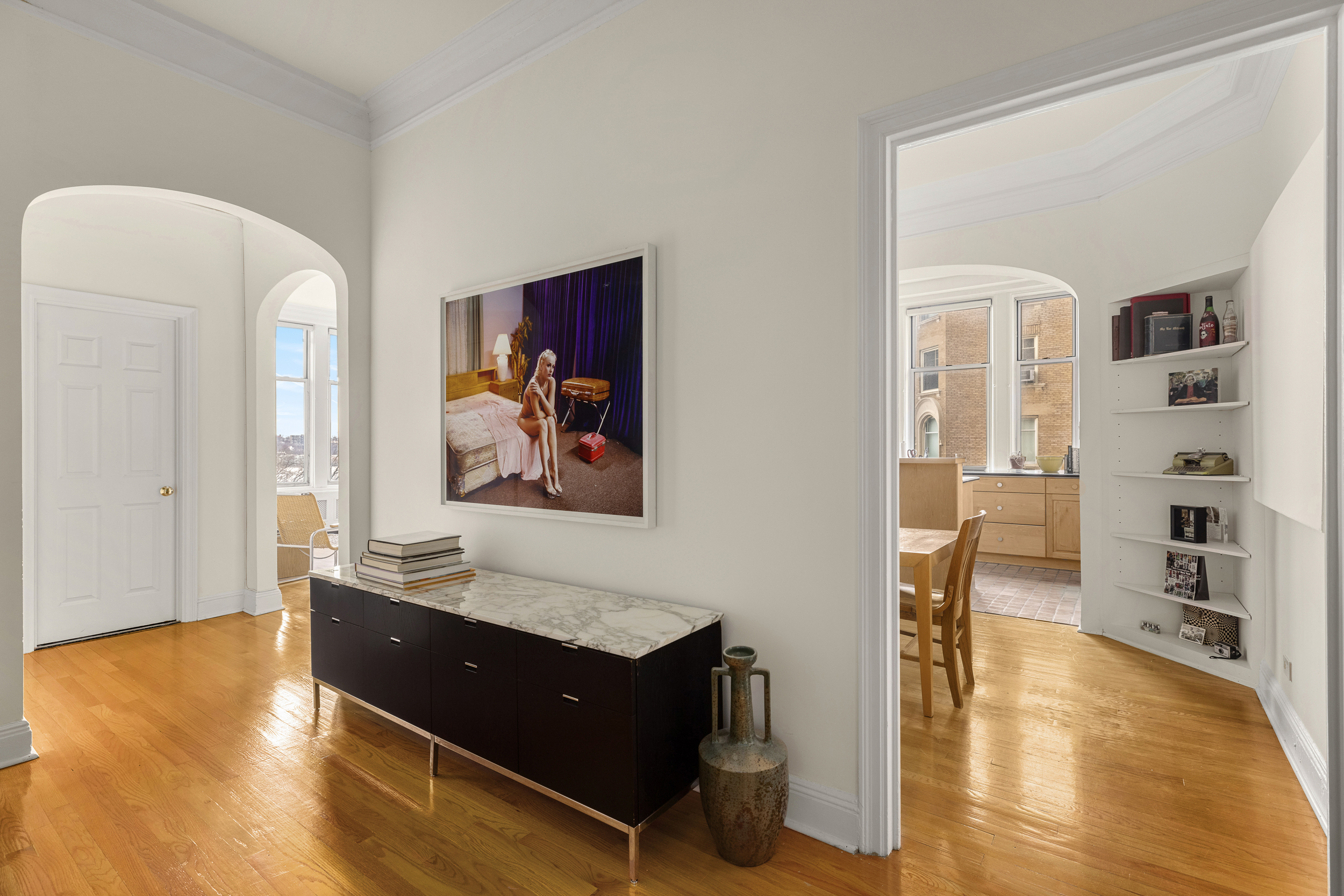 155 Riverside Drive, Unit 6B Manhattan, NY 10024 - Photo 7 of 8 a living room with fireplace furniture and decor