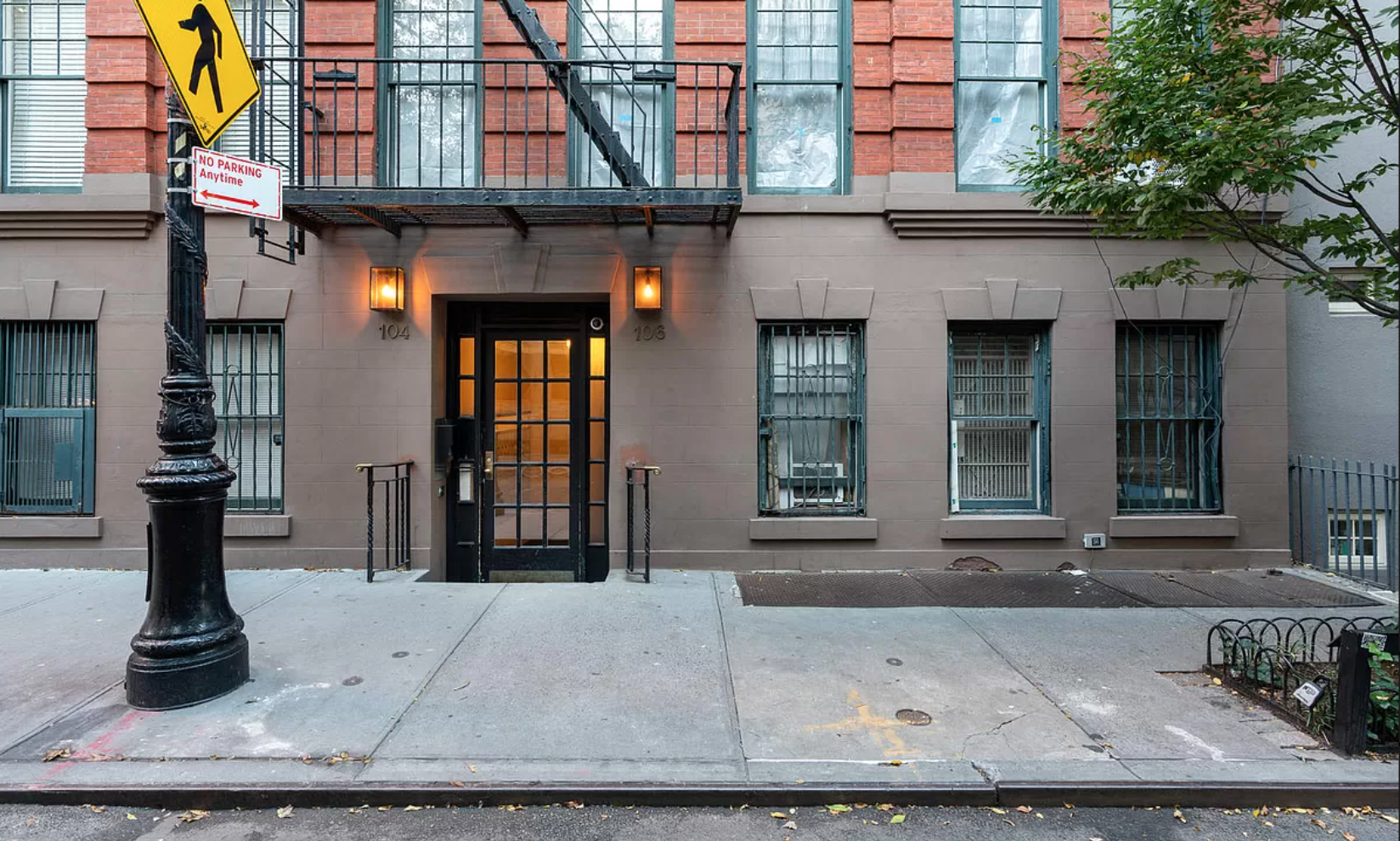 104 Bedford Street, Unit 1C Manhattan, NY 10014 - Photo 10 of 12 front view of a brick house