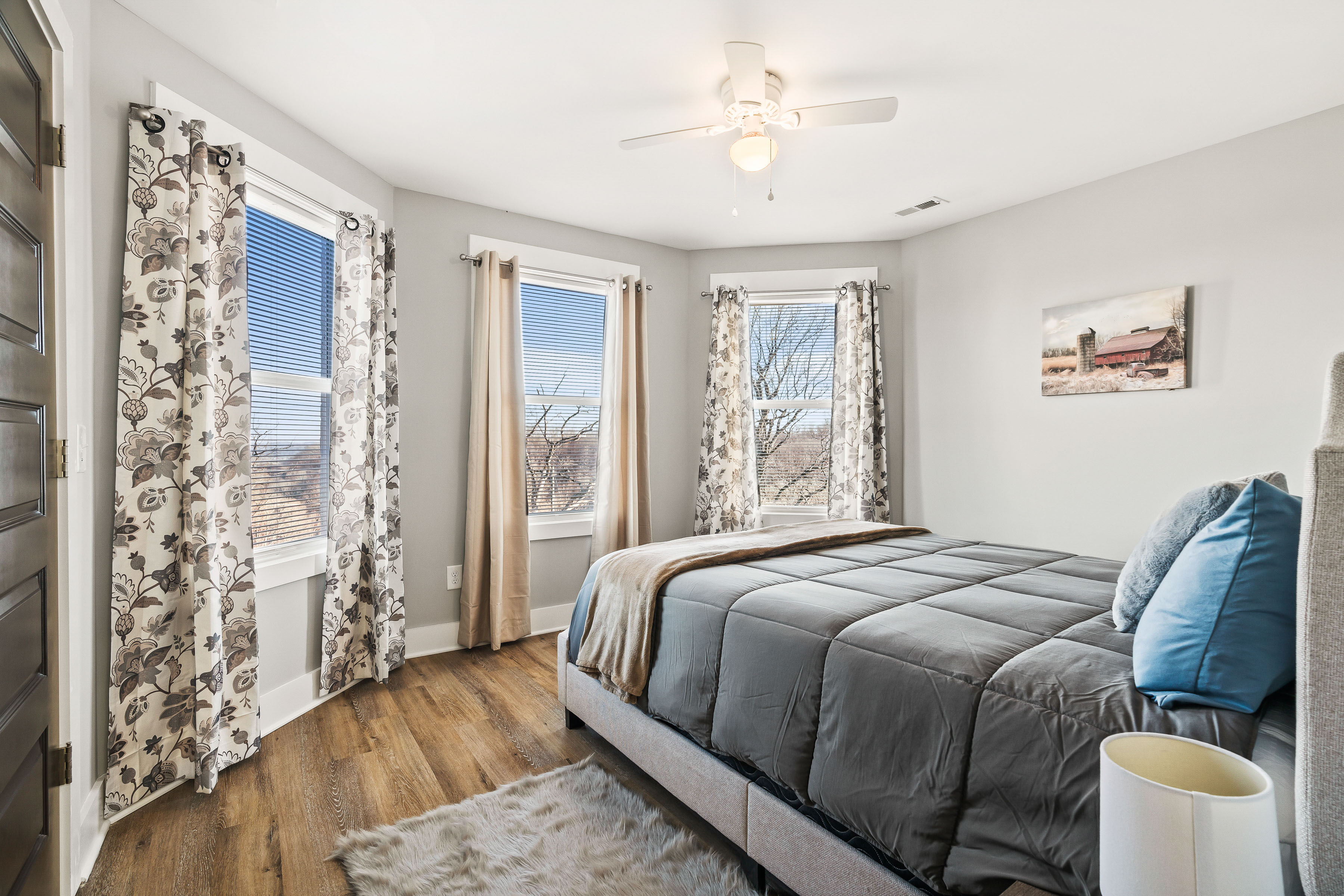 Happy Hollow Road Goodlettsville, TN 37072 - Photo 78 of 203 a bedroom with a large bed and a chandelier