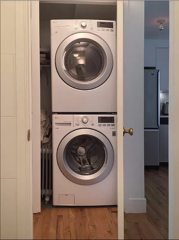 1370 Pacific Street, Unit 1 Brooklyn, NY 11216 - Photo 5 of 9 a utility room with dryer and washer