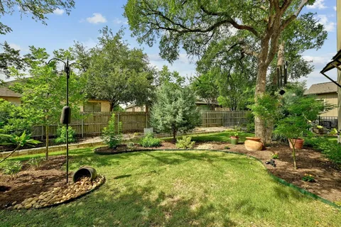 a backyard of a house with lots of green space