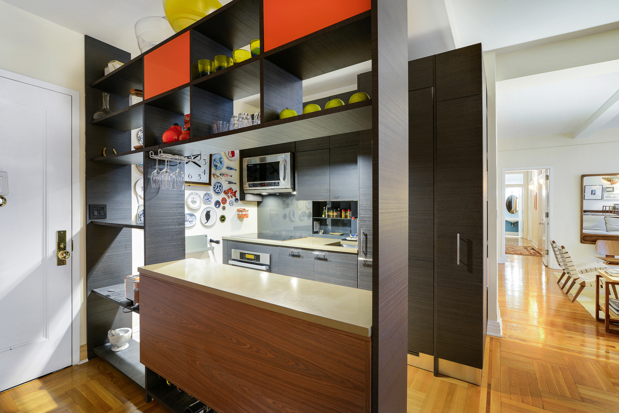 20 West 72nd Street, Unit 601 Manhattan, NY 10023 - Photo 8 of 21 a kitchen with stainless steel appliances granite countertop a refrigerator and a stove top oven