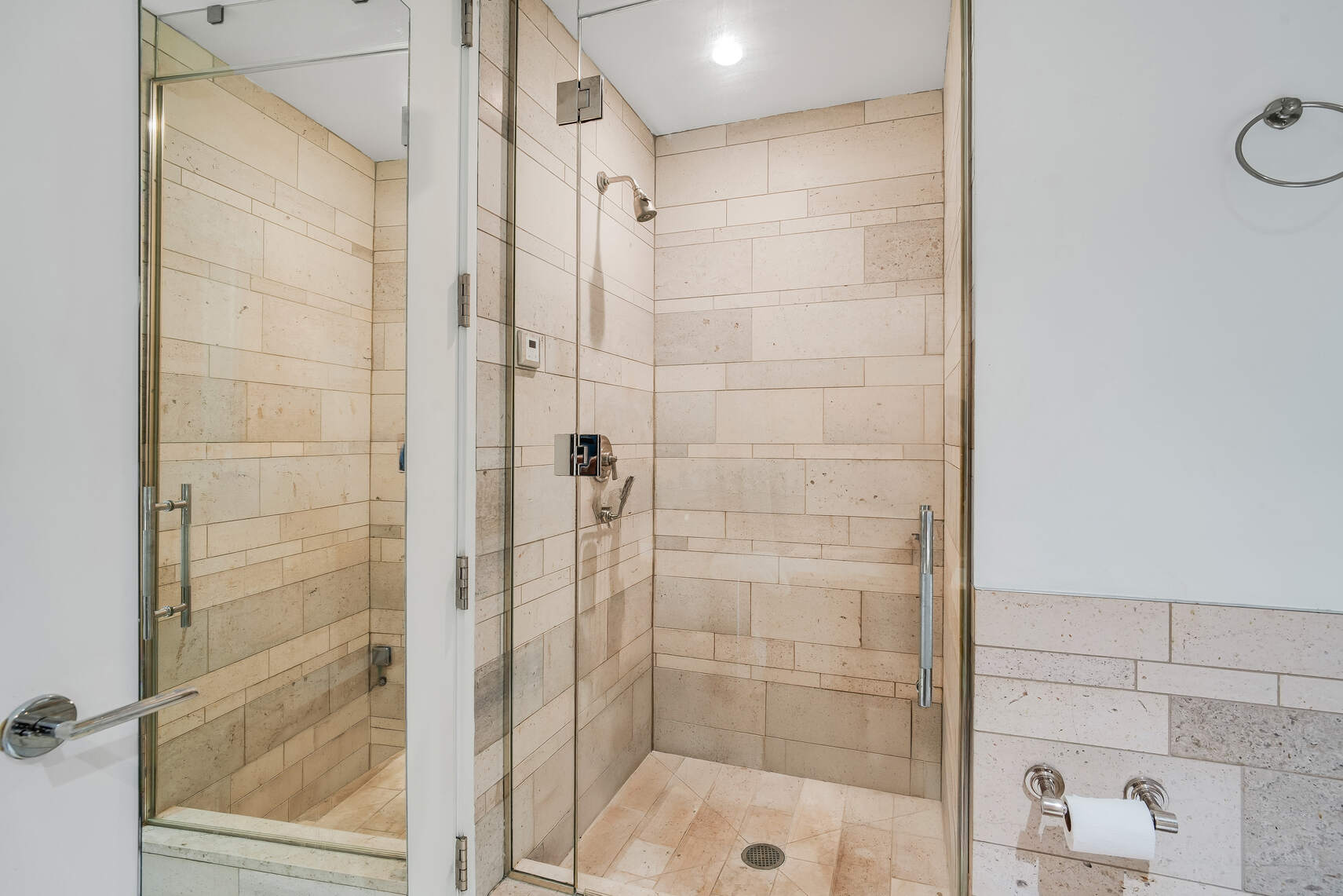 450 East 83rd Street, Unit 6B Manhattan, NY 10028 - Photo 13 of 25 a bathroom with a shower