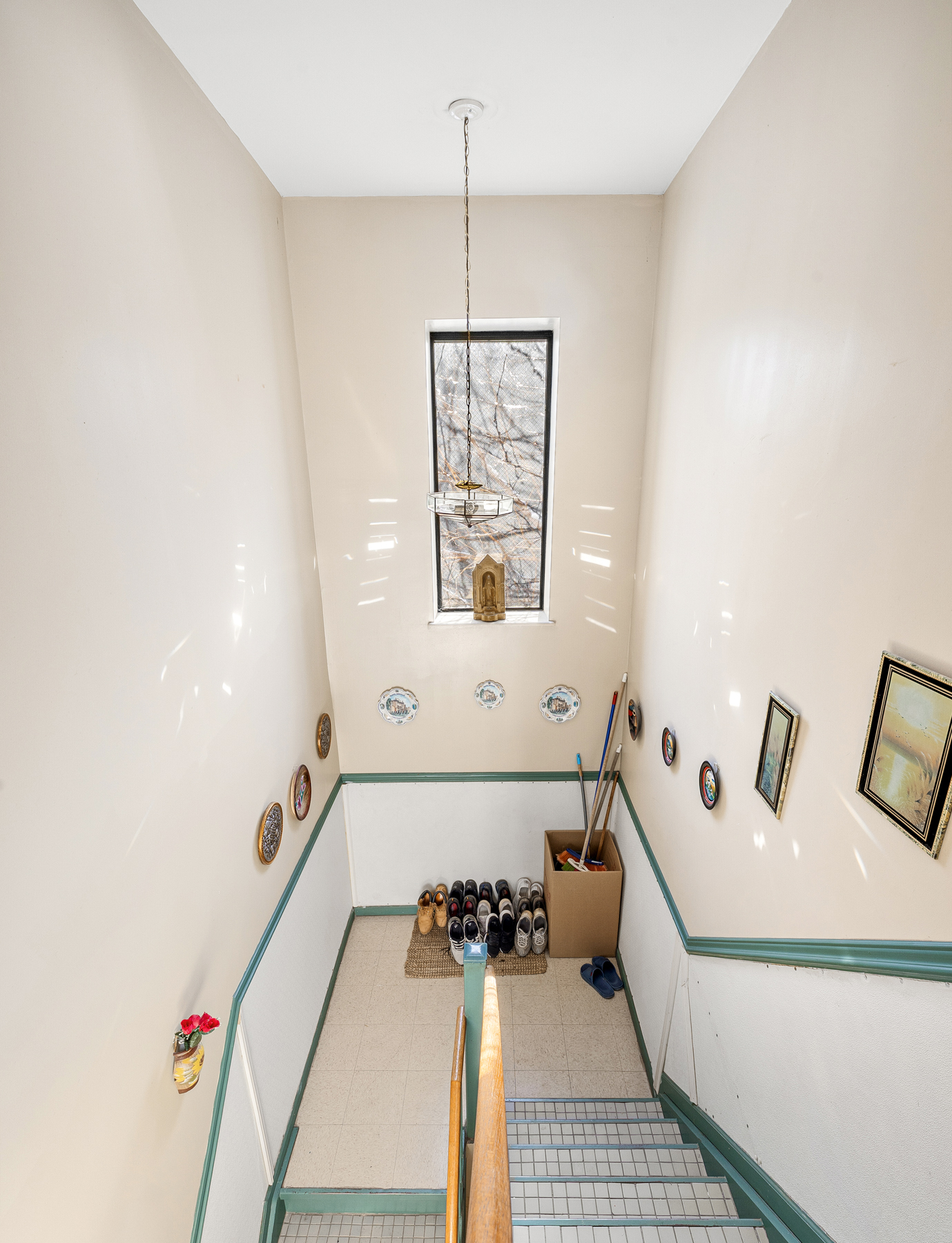 106 Crescent Street Brooklyn, NY 11208 - Photo 8 of 18 a bathroom with a bathtub and a window
