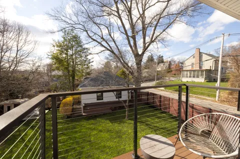 a balcony with view of lake