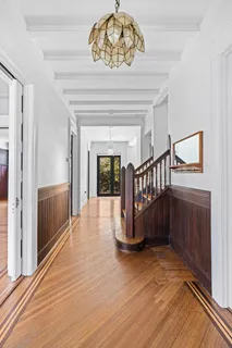a view of entryway with wooden floor