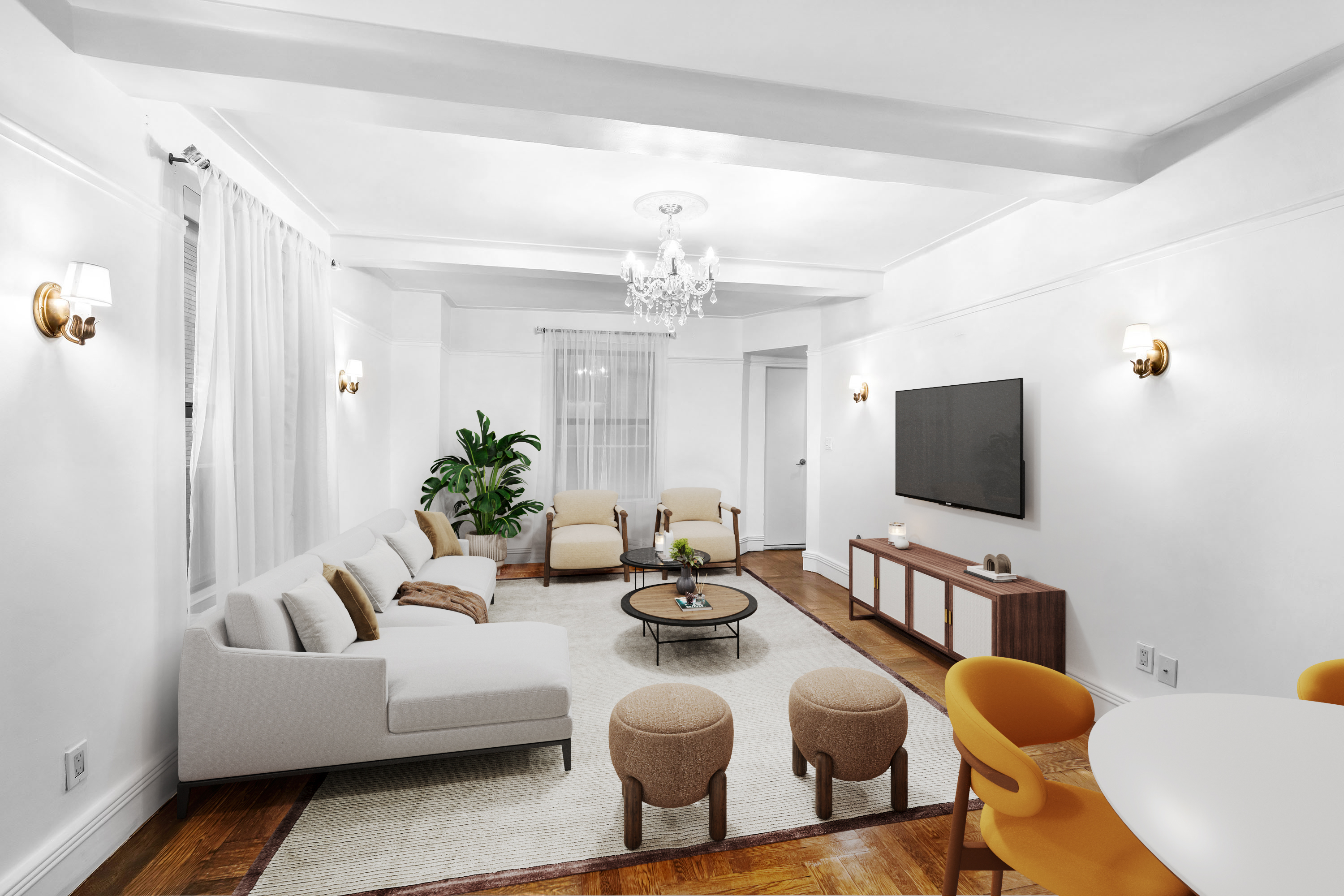 a living room with furniture a chandelier and a flat screen tv