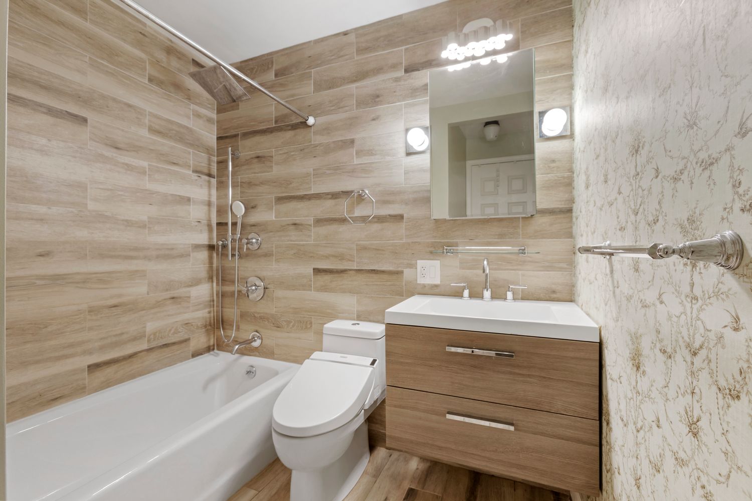 1 Irving Place, Unit U7BC Manhattan, NY 10003 - Photo 5 of 20 a bathroom with a sink toilet vanity and bathtub