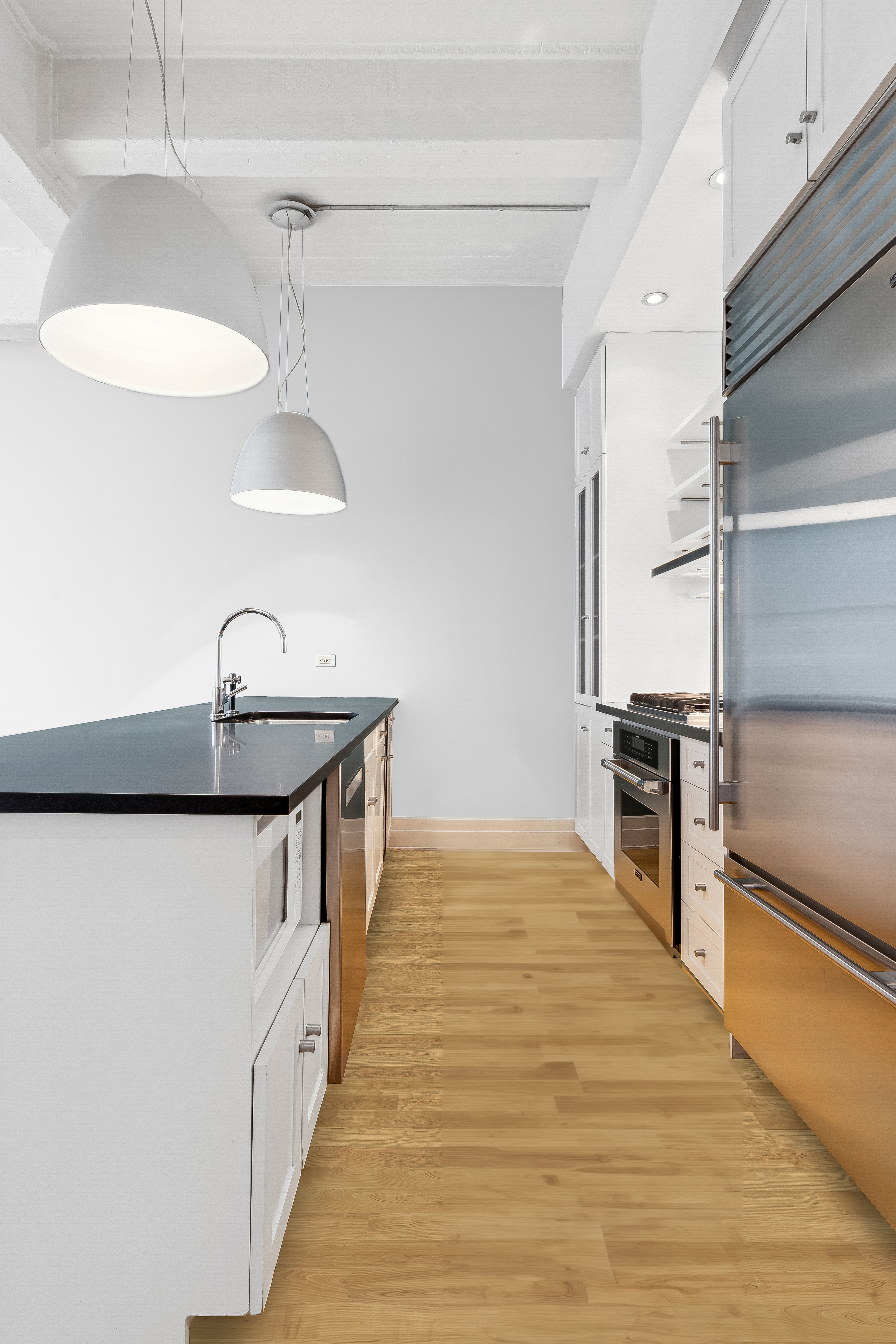 70 Washington Street, Unit 4U Brooklyn, NY 11201 - Photo 3 of 14 a kitchen with stainless steel appliances a sink and a refrigerator